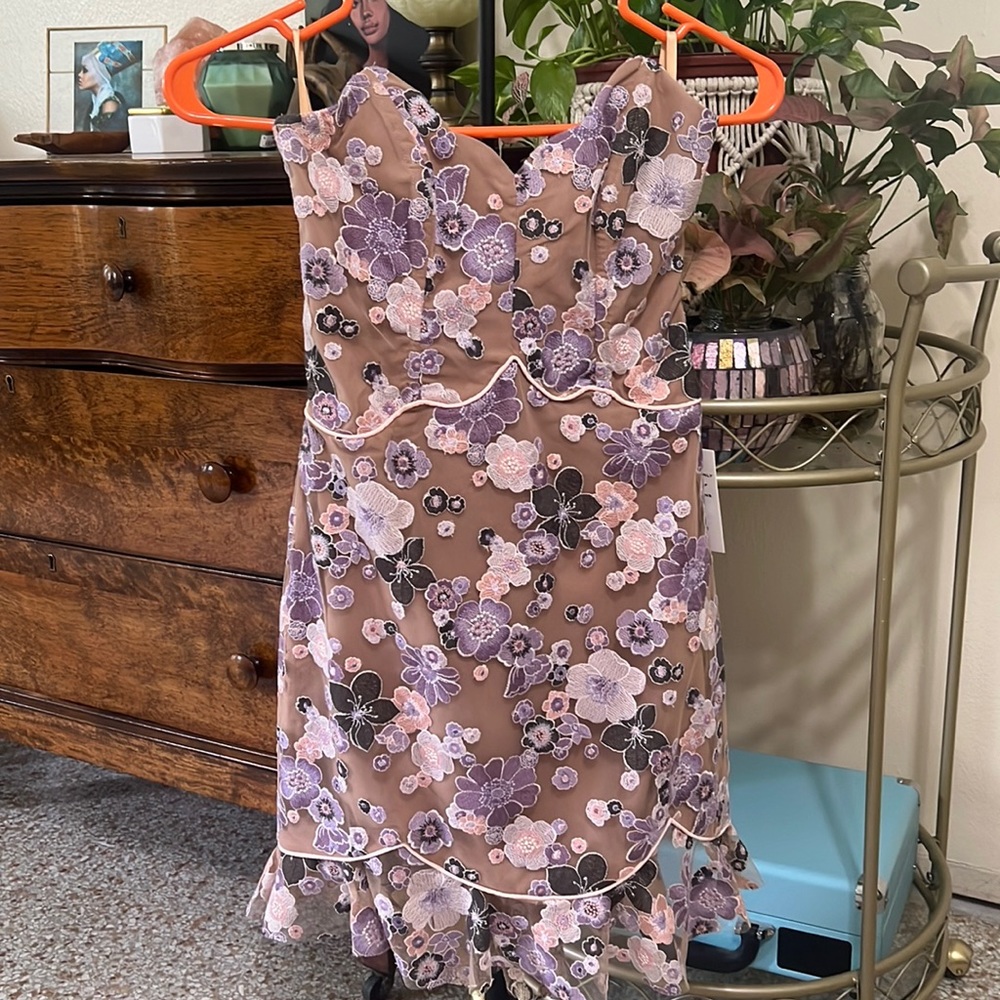 Strapless nude dress with purple and pink floral accents. New with tags